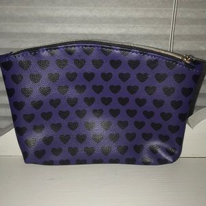 2/10 Purple makeup bag with hearts.